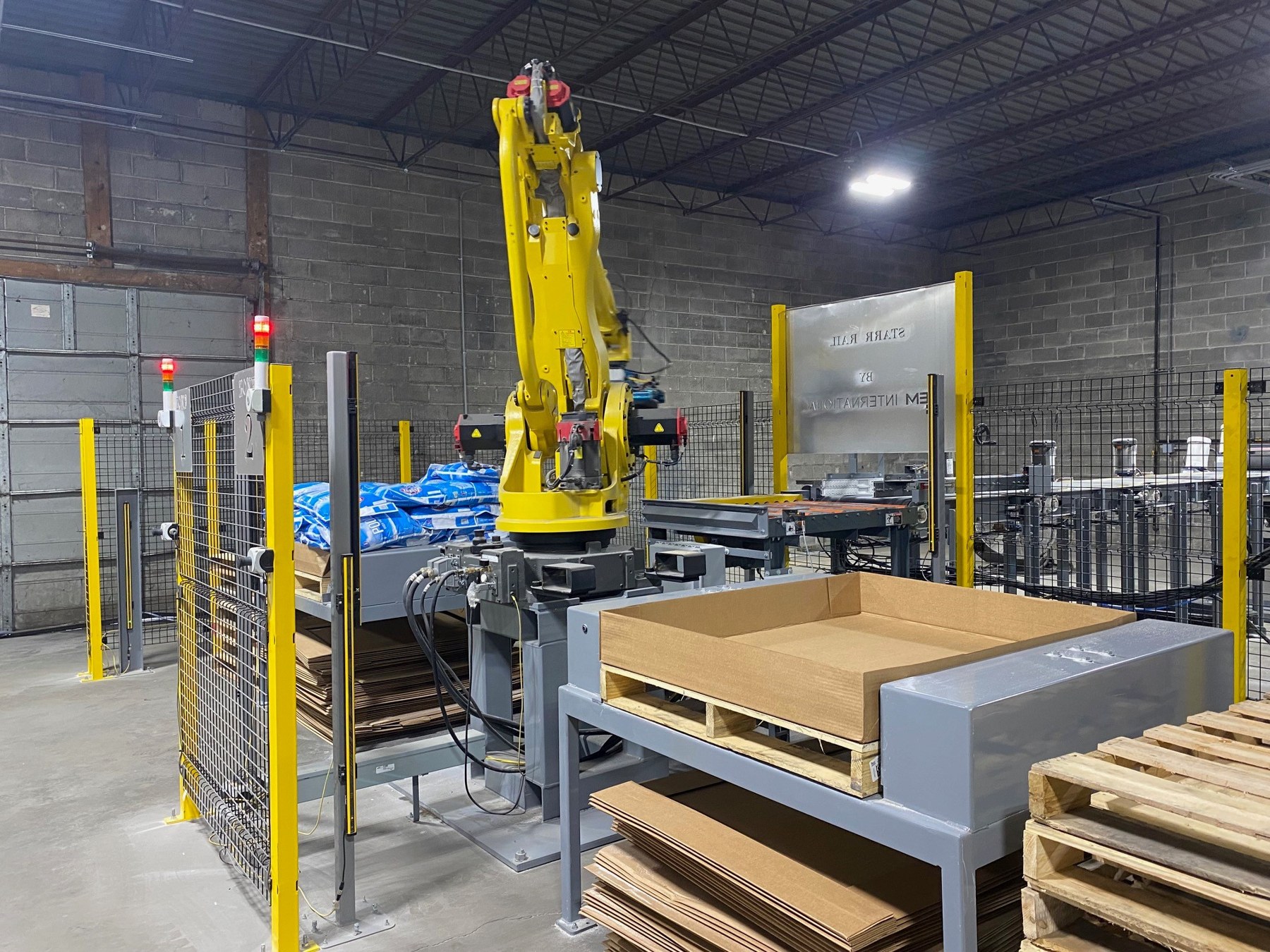 Robotic contract packaging equipment