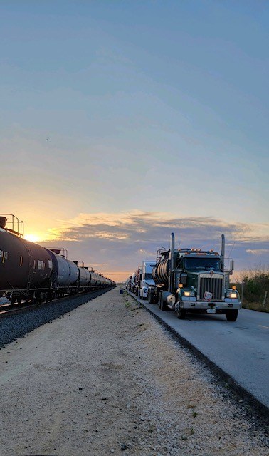 Truck and railcars at a transloading operation