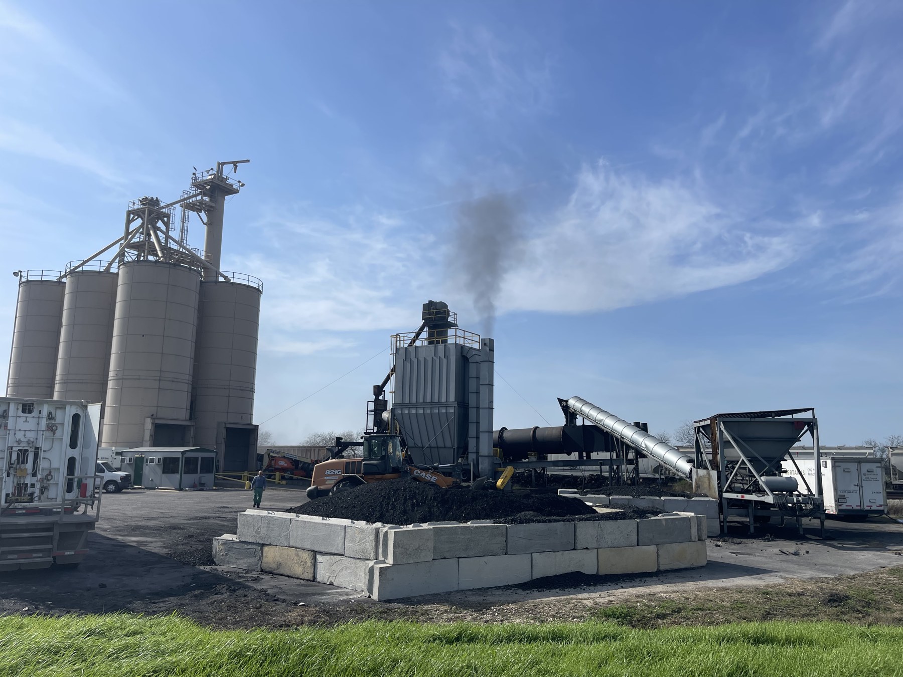 Silos and material-handling equipment at an industrial facility