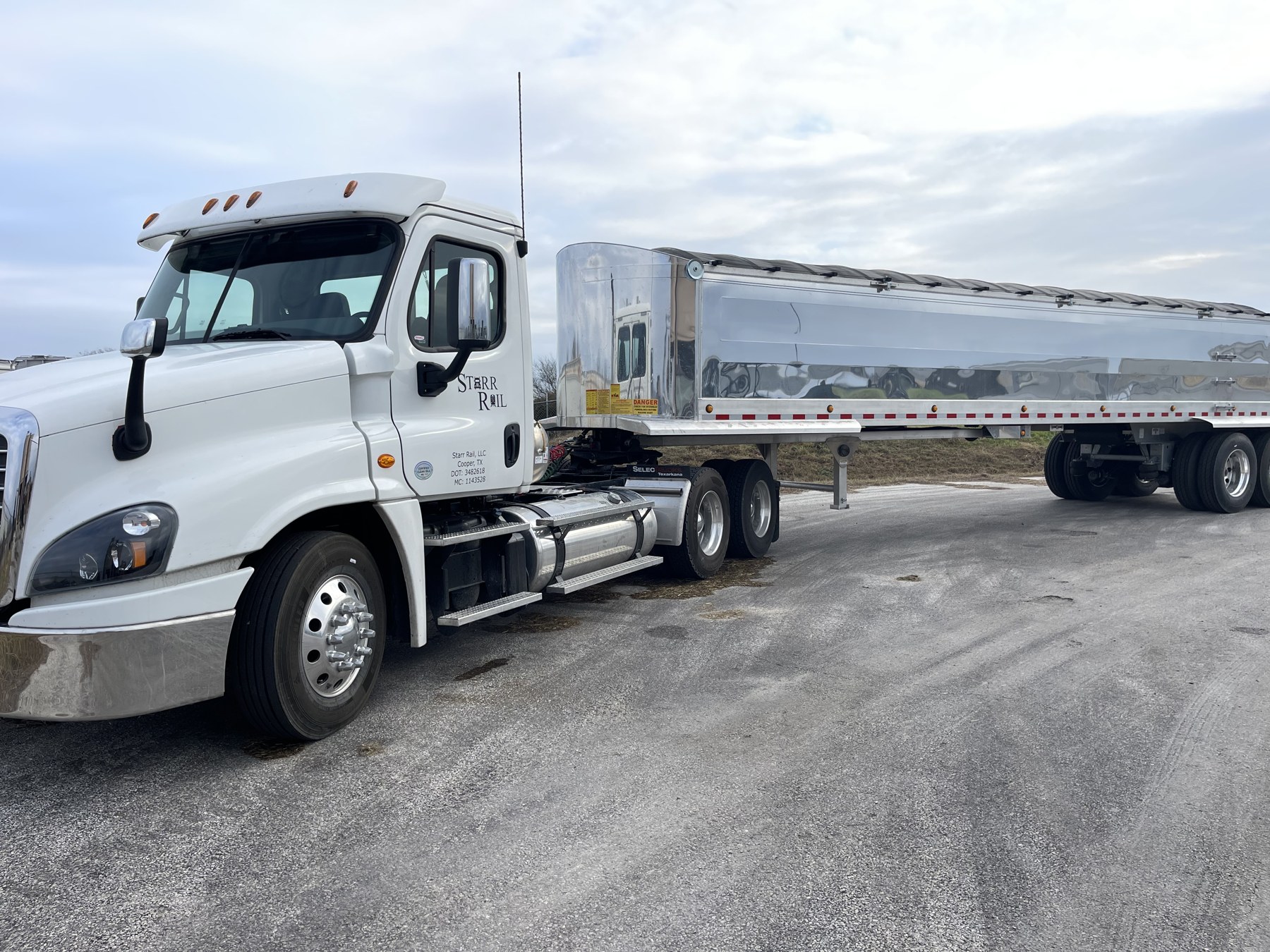 Tractor and trailer at an industrial facility